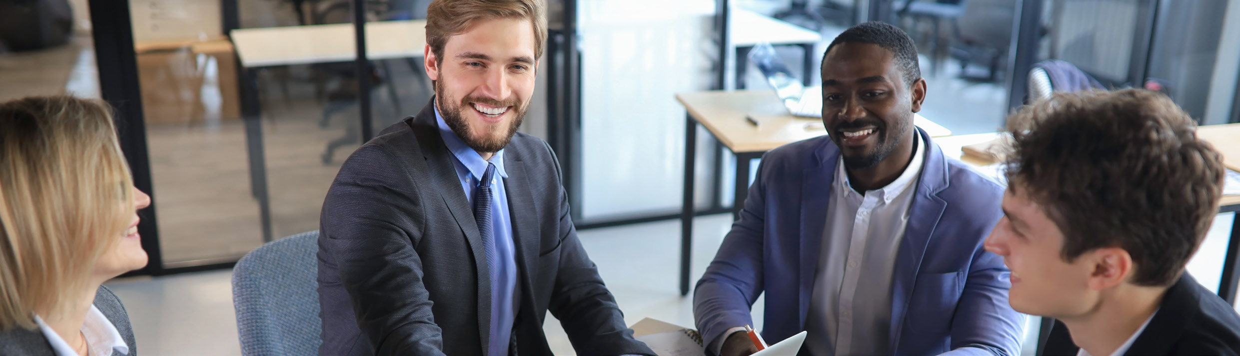 Legal professionals collaborating in a modern office